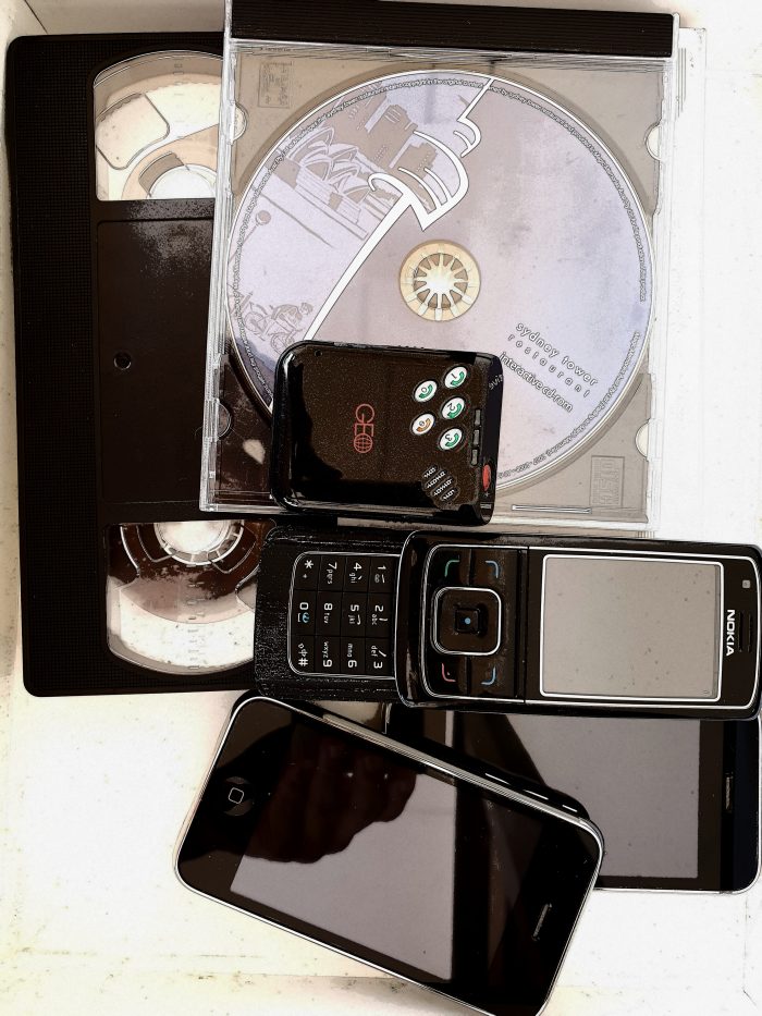 Tape , CD , pager and old mobile